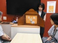 輪島朝市での奮闘描く　金沢駅 紙芝居作家が上演会